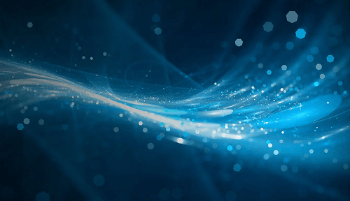 Abstraktes Bild, das ein fließendes Design aus blauen Lichtwellen und glitzernden Partikeln auf dunklem Hintergrund zeigt. Die Szene wirkt dynamisch und fließend und vermittelt ein Gefühl von Bewegung und Energie.